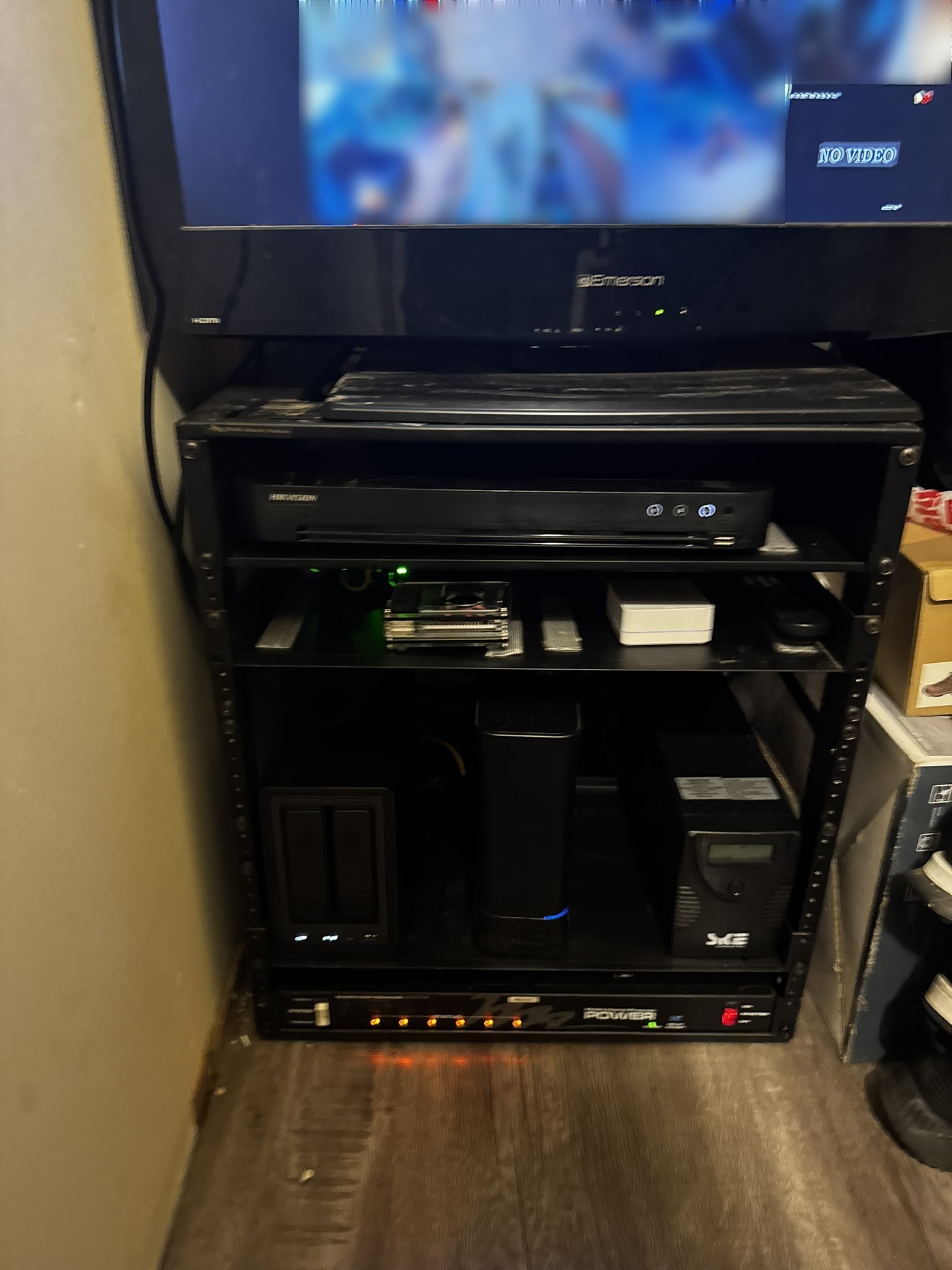 Close-up of a compact equipment rack installed and organized by Arelova